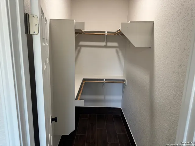 a view of staircase and utility room