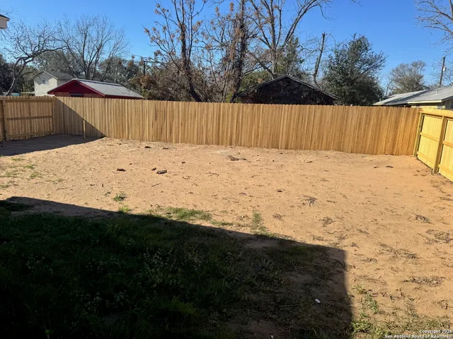 a view of wooden fence