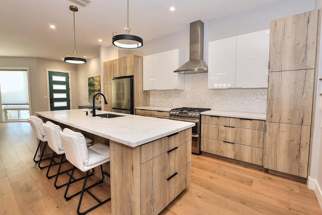 4014 Capitola Hills Court Fair Oaks, CA 95628 - Photo 17 of 59 a kitchen with a sink a counter space and appliances