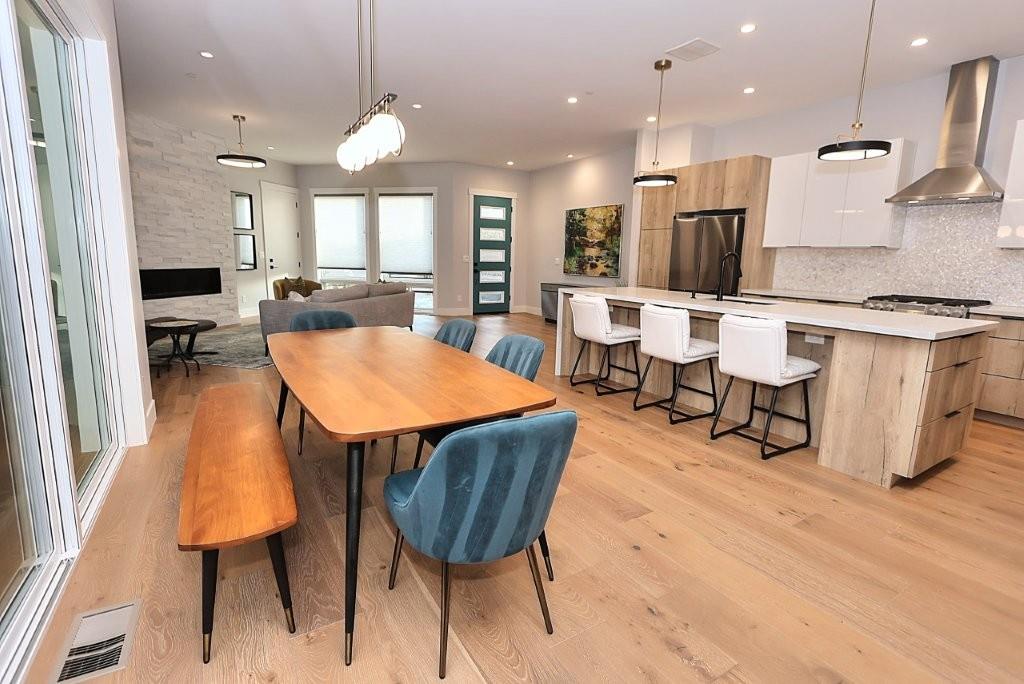 4014 Capitola Hills Court Fair Oaks, CA 95628 - Photo 19 of 59 a large kitchen with a table and chairs