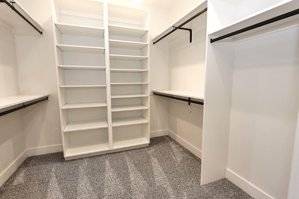 4014 Capitola Hills Court Fair Oaks, CA 95628 - Photo 30 of 59 a view of walk in closet with empty racks