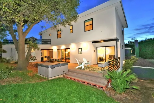 a view of swimming pool from a balcony