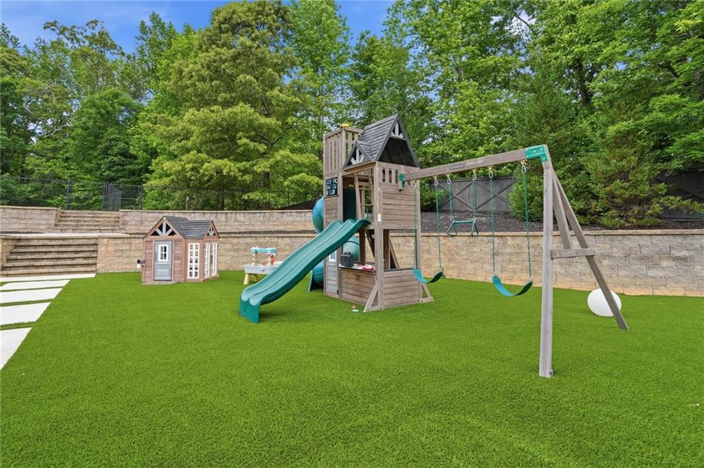 3020 Wallace Road Buford, GA 30519 - Photo 55 of 66 a view of a house with a park