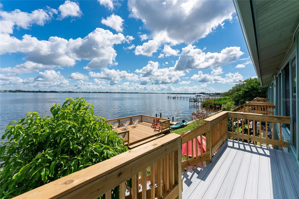 5041 North Beach Road, Unit 1A Englewood, FL 34223 - Photo 17 of 19 a view of a balcony with wooden floor