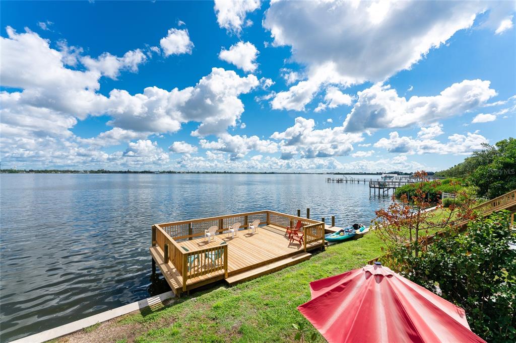 5041 North Beach Road, Unit 1A Englewood, FL 34223 - Photo 18 of 19 a view of a swimming pool with a lake view