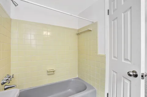 a bathroom with a bathtub