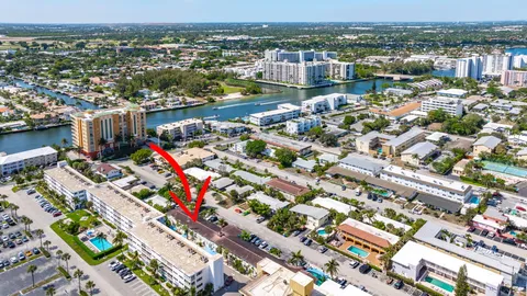 a front view of a building with sitting space