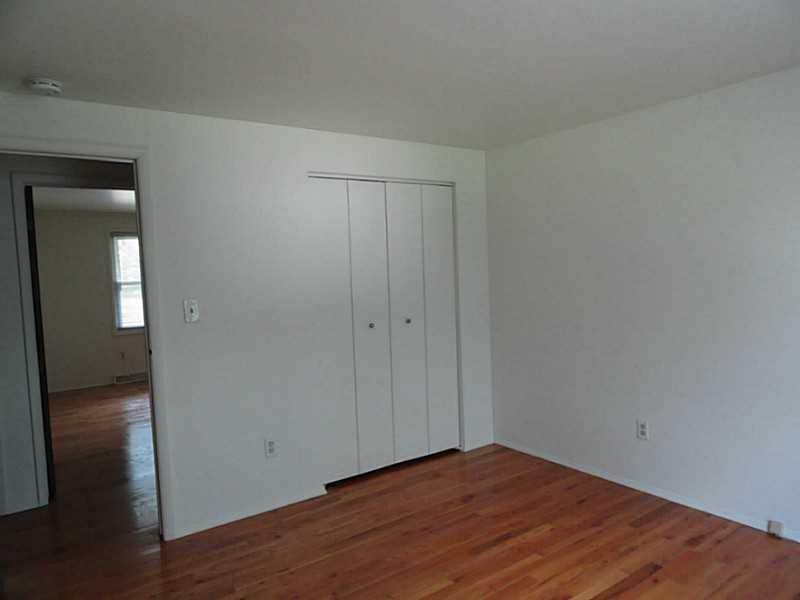 456 Tivoli Road Plum, PA 15239 - Photo 11 of 21 Master Bedroom. All of the bedrooms have hardwood floors.