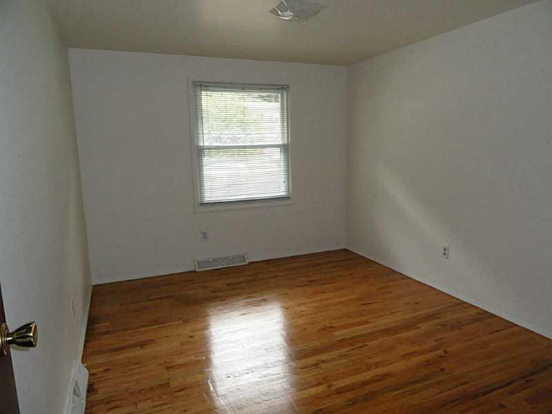 456 Tivoli Road Plum, PA 15239 - Photo 13 of 21 Bedroom. The floor in this bedroom was recently refinished.