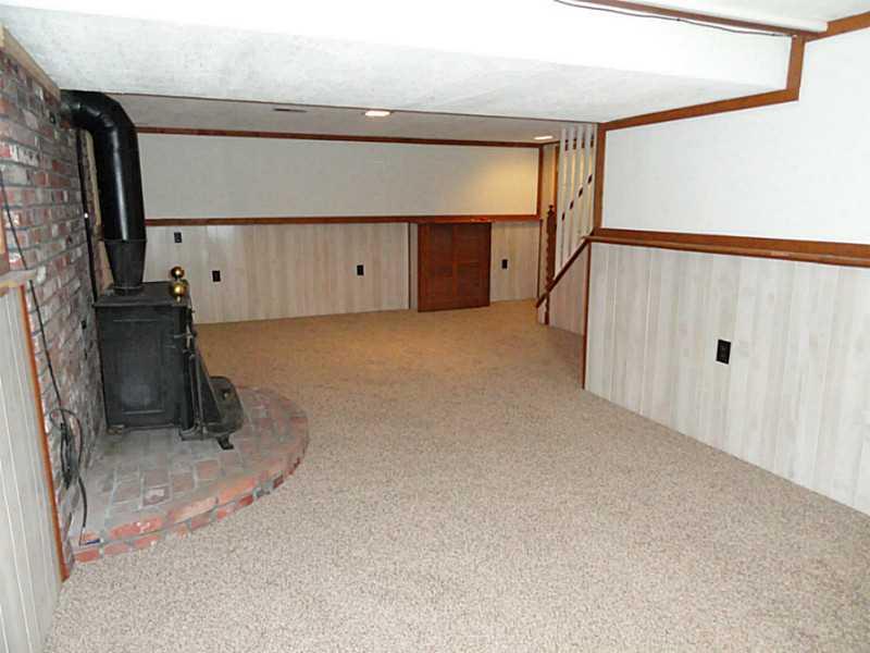 456 Tivoli Road Plum, PA 15239 - Photo 17 of 21 Basement/Game Room. The game room has been remodeled with fresh paint, paneling and carpeting!