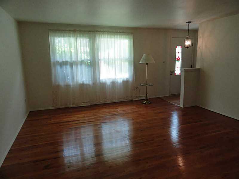 456 Tivoli Road Plum, PA 15239 - Photo 3 of 21 Living Room. Spacious 17 x15 living room with hardwood flooring.