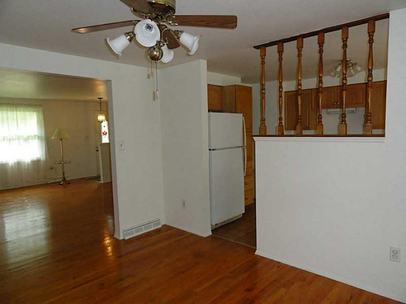 456 Tivoli Road Plum, PA 15239 - Photo 4 of 21 Dining Room. The formal dining room is open to the living room and kitchen.