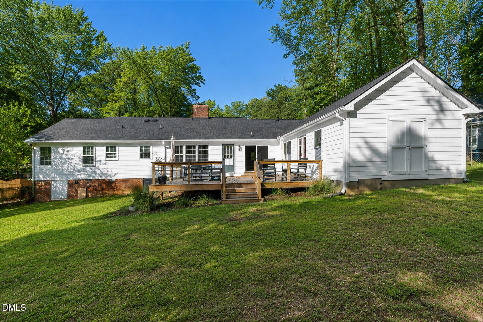 5904 Volant Drive Raleigh, NC 27609 - Photo 39 of 42 a view of a house with a yard and sitting area
