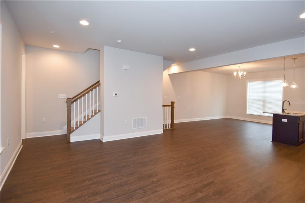 122 Gress Road Cranberry Township, PA 16066 - Photo 15 of 33 a view of an empty room with wooden floor
