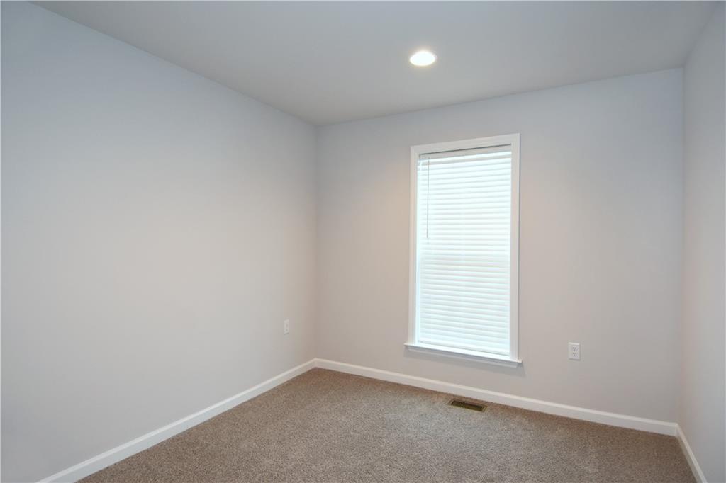 122 Gress Road Cranberry Township, PA 16066 - Photo 25 of 33 an empty room with a window