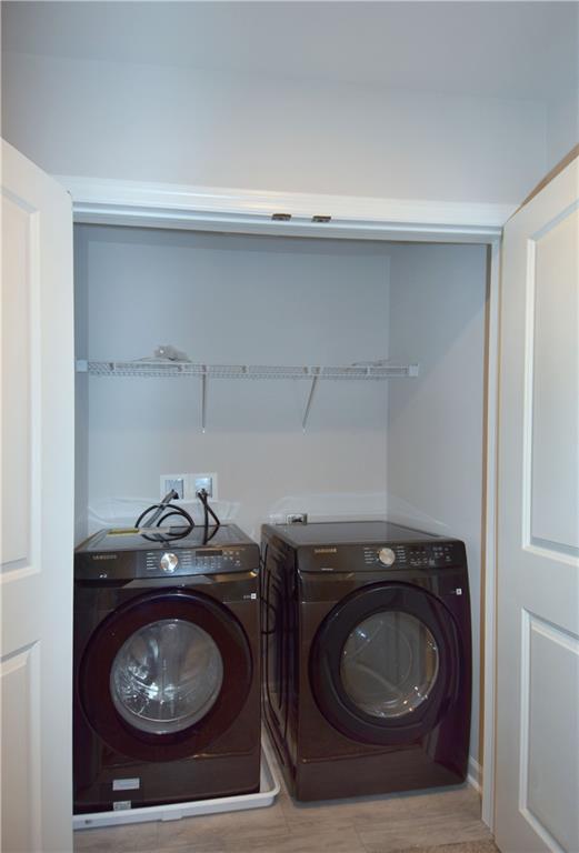 122 Gress Road Cranberry Township, PA 16066 - Photo 27 of 33 a close up of a washer and dryer
