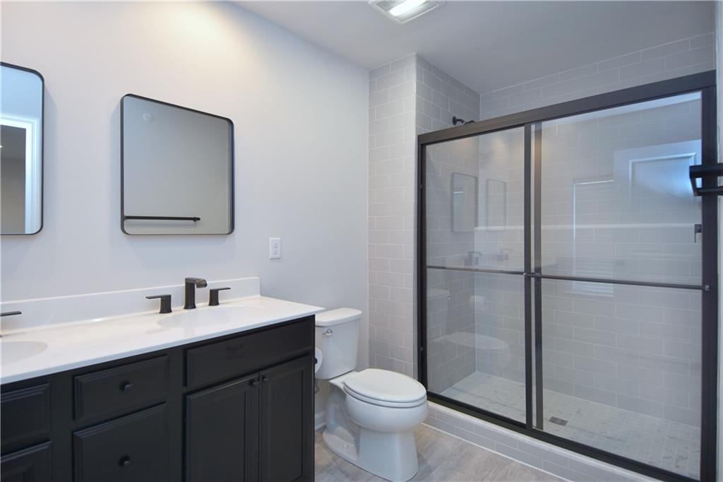 122 Gress Road Cranberry Township, PA 16066 - Photo 32 of 33 a bathroom with a toilet sink and shower