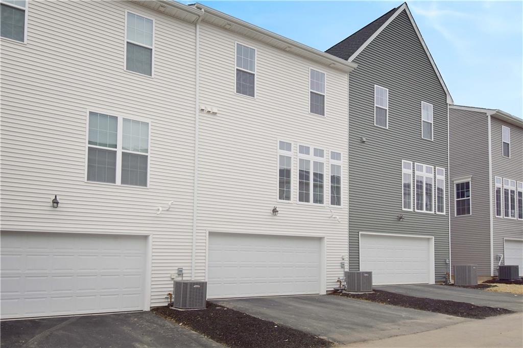 122 Gress Road Cranberry Township, PA 16066 - Photo 4 of 33 a front view of a house with a parking area