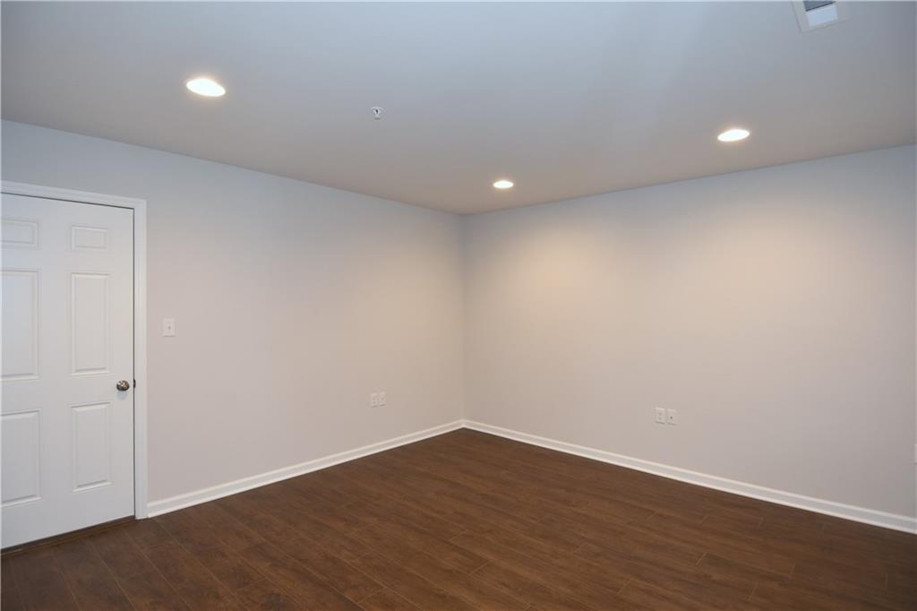 122 Gress Road Cranberry Township, PA 16066 - Photo 8 of 33 a view of an empty room with wooden floor