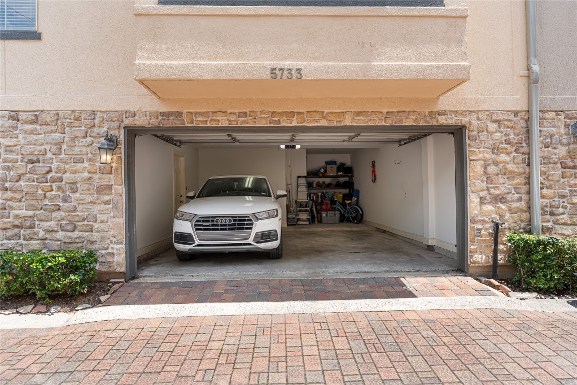 5733 Kansas Street Houston, TX 77007 - Photo 11 of 36 a car parked on the side of a building