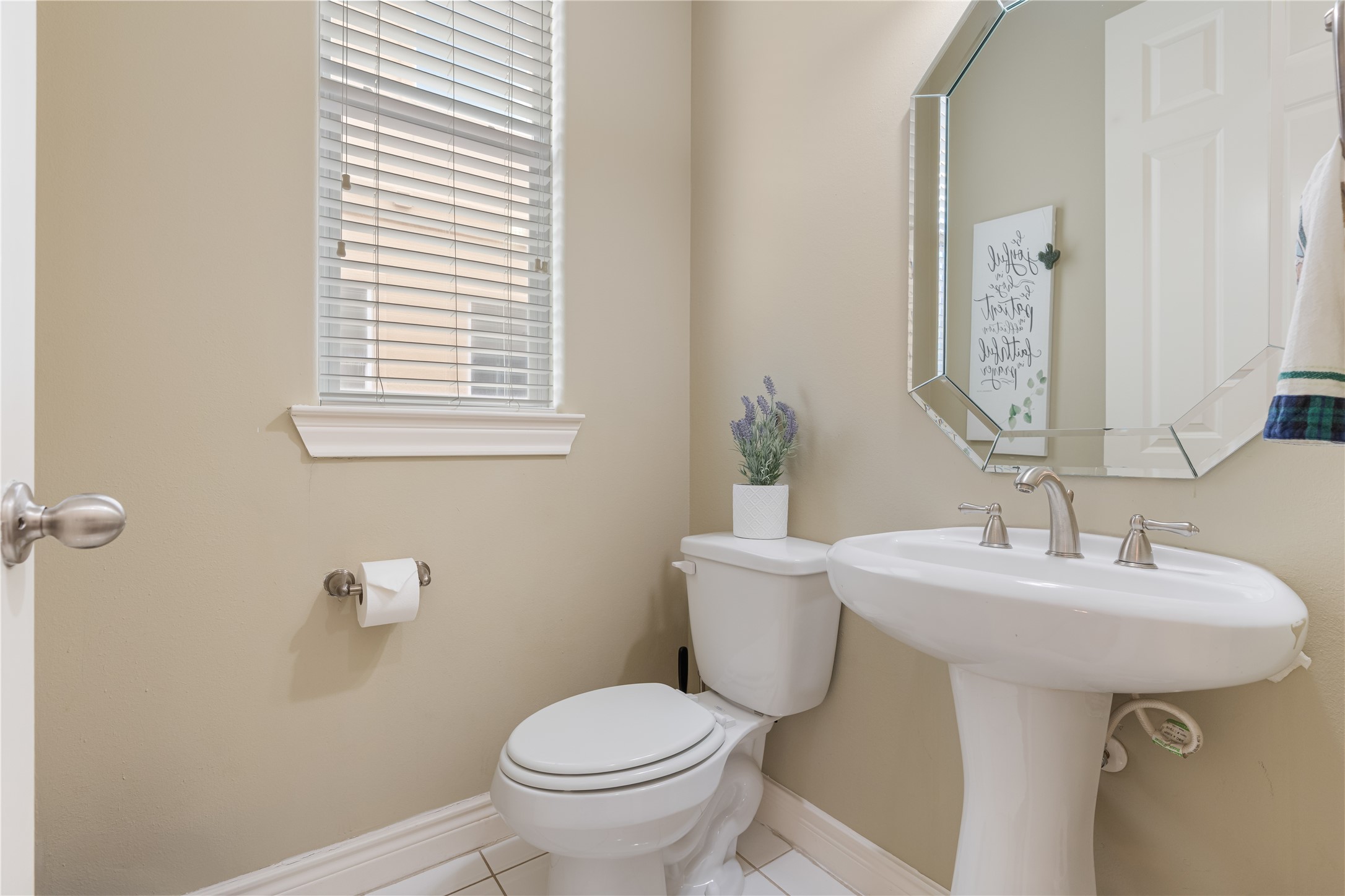 5733 Kansas Street Houston, TX 77007 - Photo 24 of 36 a bathroom with a sink toilet and mirror