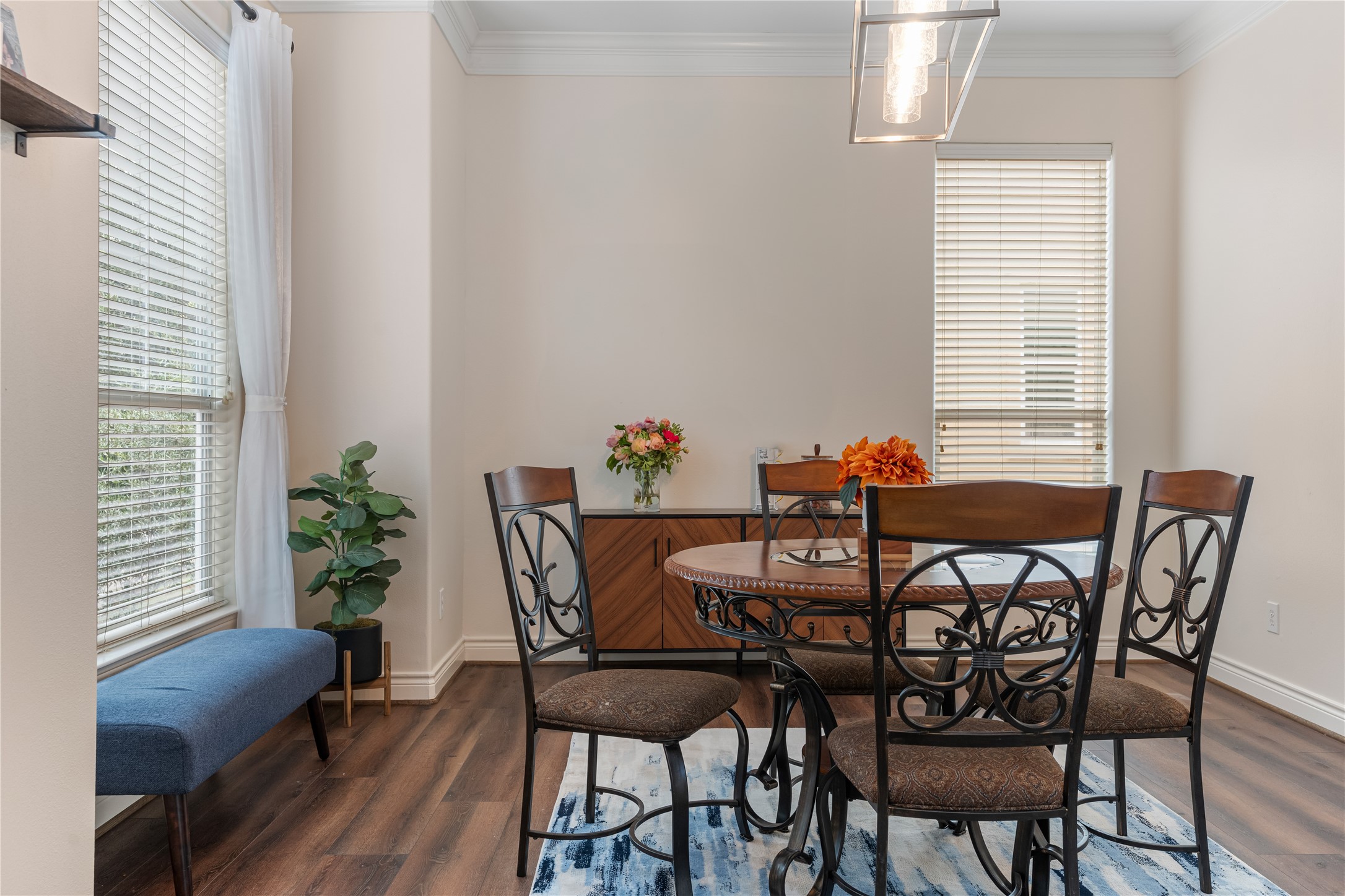 5733 Kansas Street Houston, TX 77007 - Photo 25 of 36 a view of a dining room with furniture and wooden floor