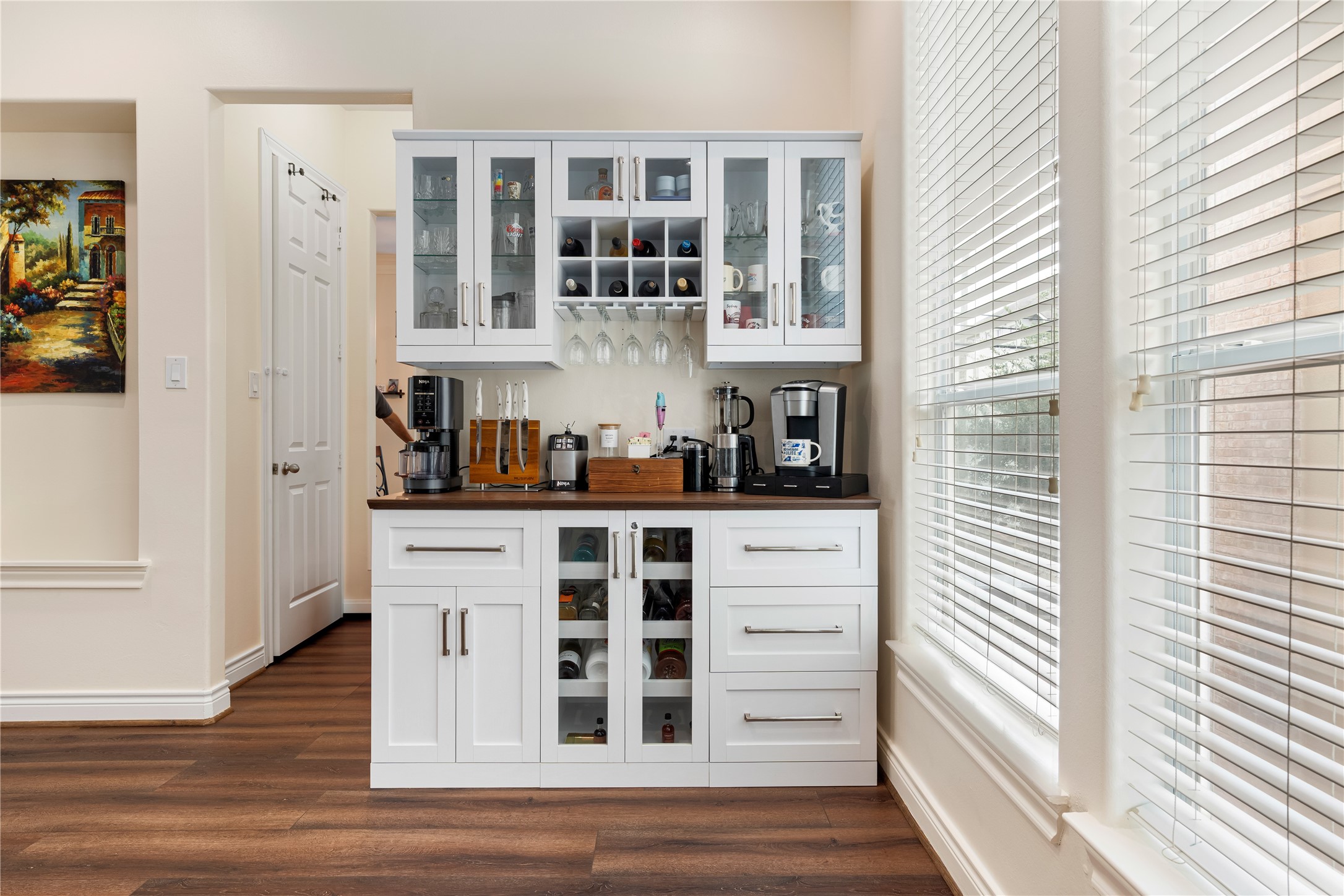 5733 Kansas Street Houston, TX 77007 - Photo 28 of 36 a kitchen with stainless steel appliances cabinets and a window