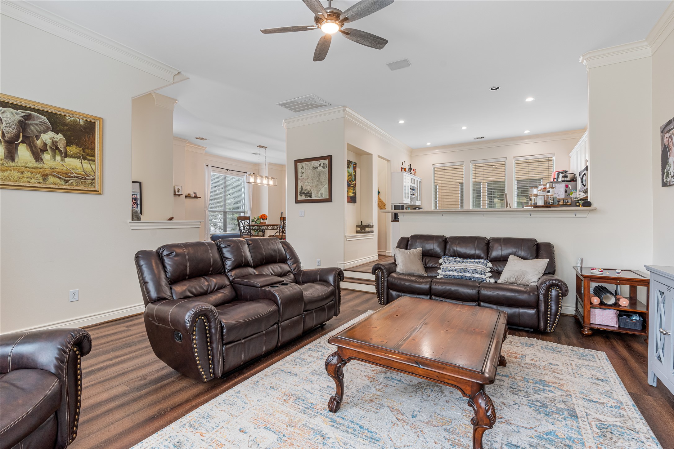 5733 Kansas Street Houston, TX 77007 - Photo 31 of 36 a living room with furniture and a ceiling fan