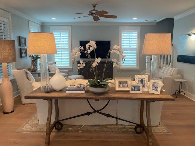 103 Jack Knife Drive Watersound, FL 32461 - Photo 11 of 24 a room with a table chairs and a chandelier