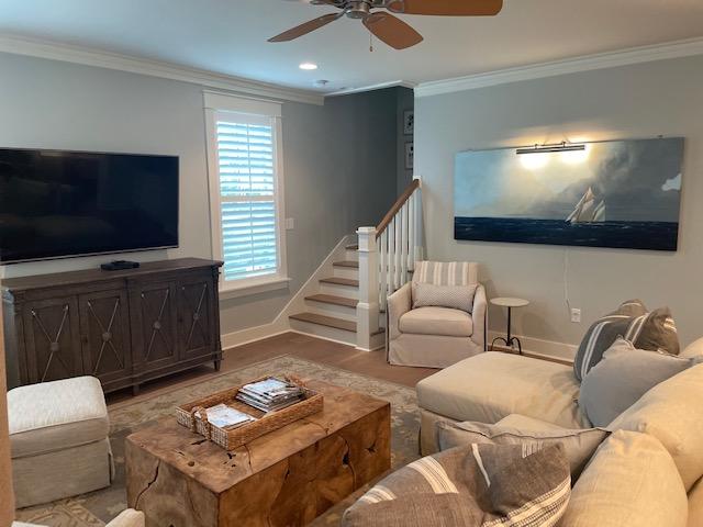 103 Jack Knife Drive Watersound, FL 32461 - Photo 12 of 24 a living room with furniture and a flat screen tv