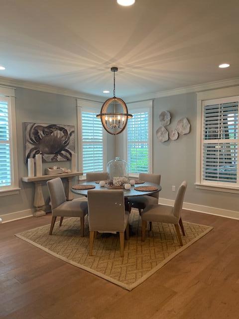 103 Jack Knife Drive Watersound, FL 32461 - Photo 14 of 24 a view of a dining room with furniture window and outside view