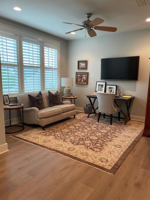 103 Jack Knife Drive Watersound, FL 32461 - Photo 20 of 24 a living room with furniture and a flat screen tv