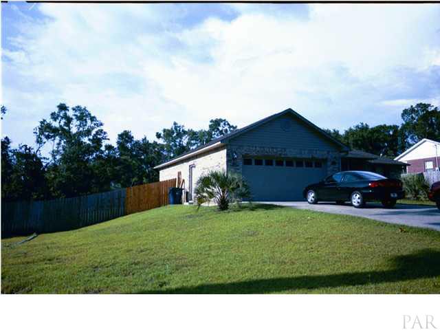 7456 Johnson Road Milton, FL 32583 - Photo 2 of 16 FRONT SIDE VIEW OF HOME---HIGH & DRY