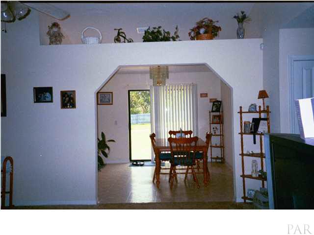 7456 Johnson Road Milton, FL 32583 - Photo 4 of 16 VIEW FROM FAMILY ROOM INTO DINING AREA