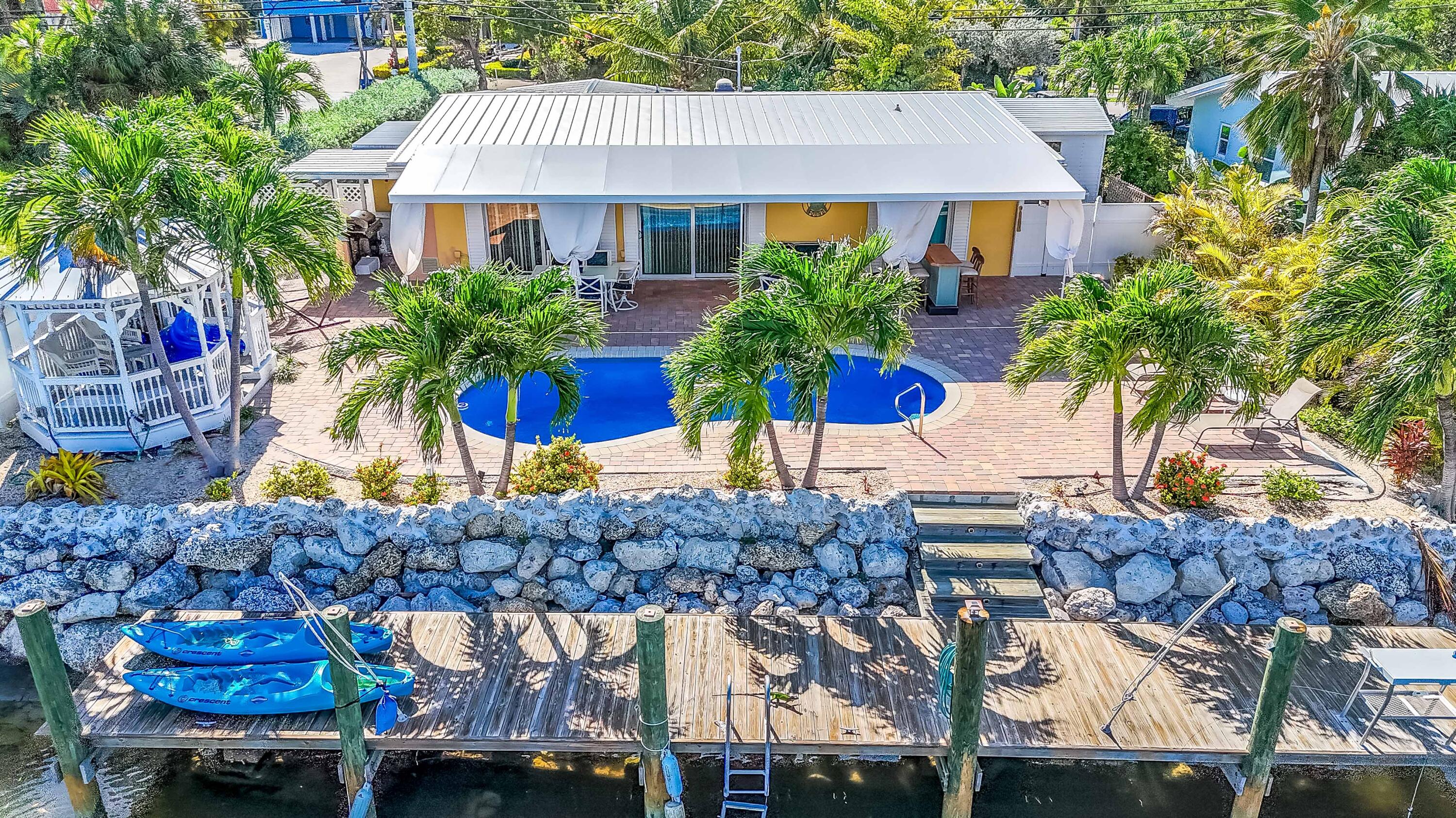 Canal home with a pool