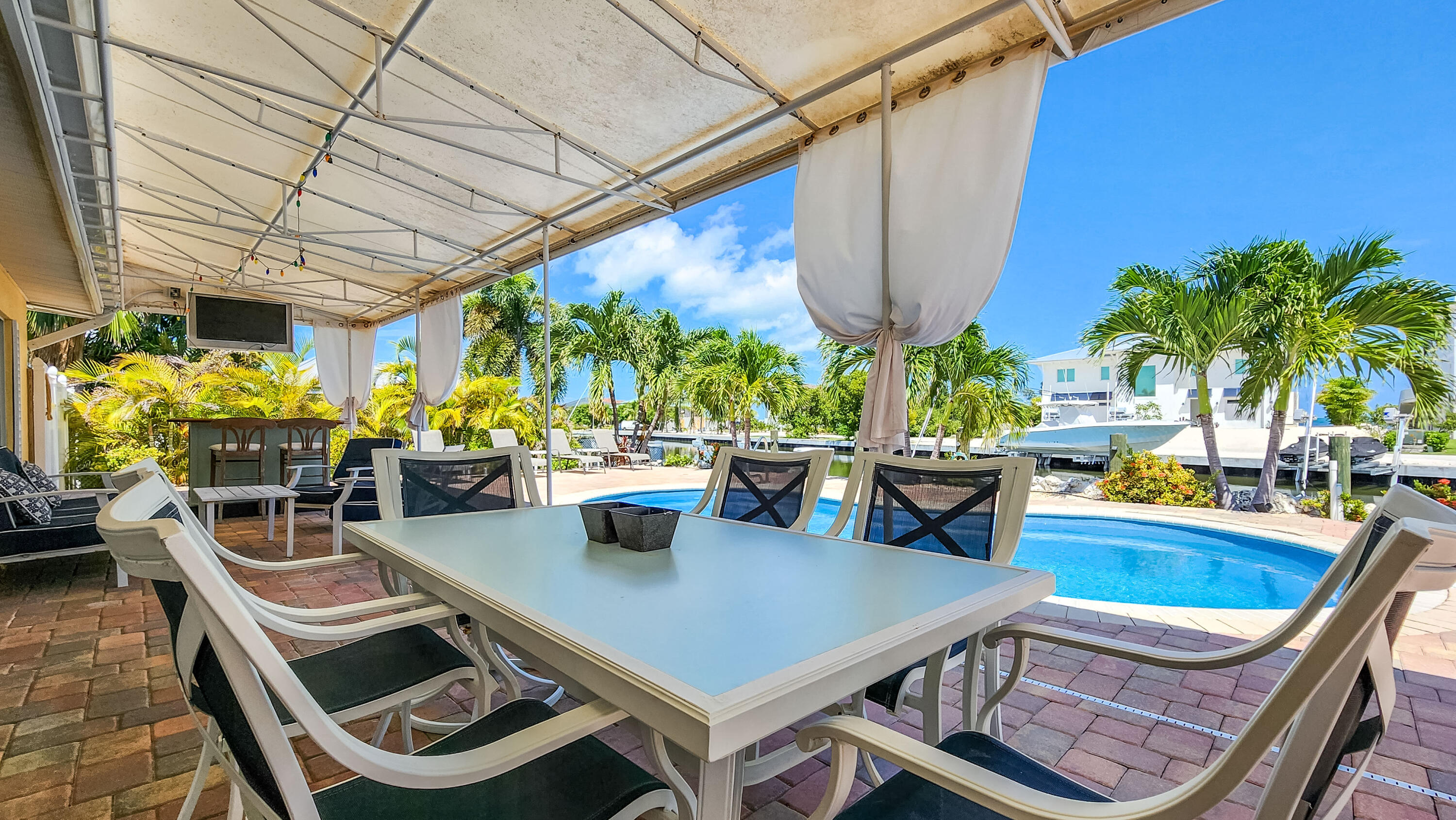 Canal home with a pool gazebo docks ocea