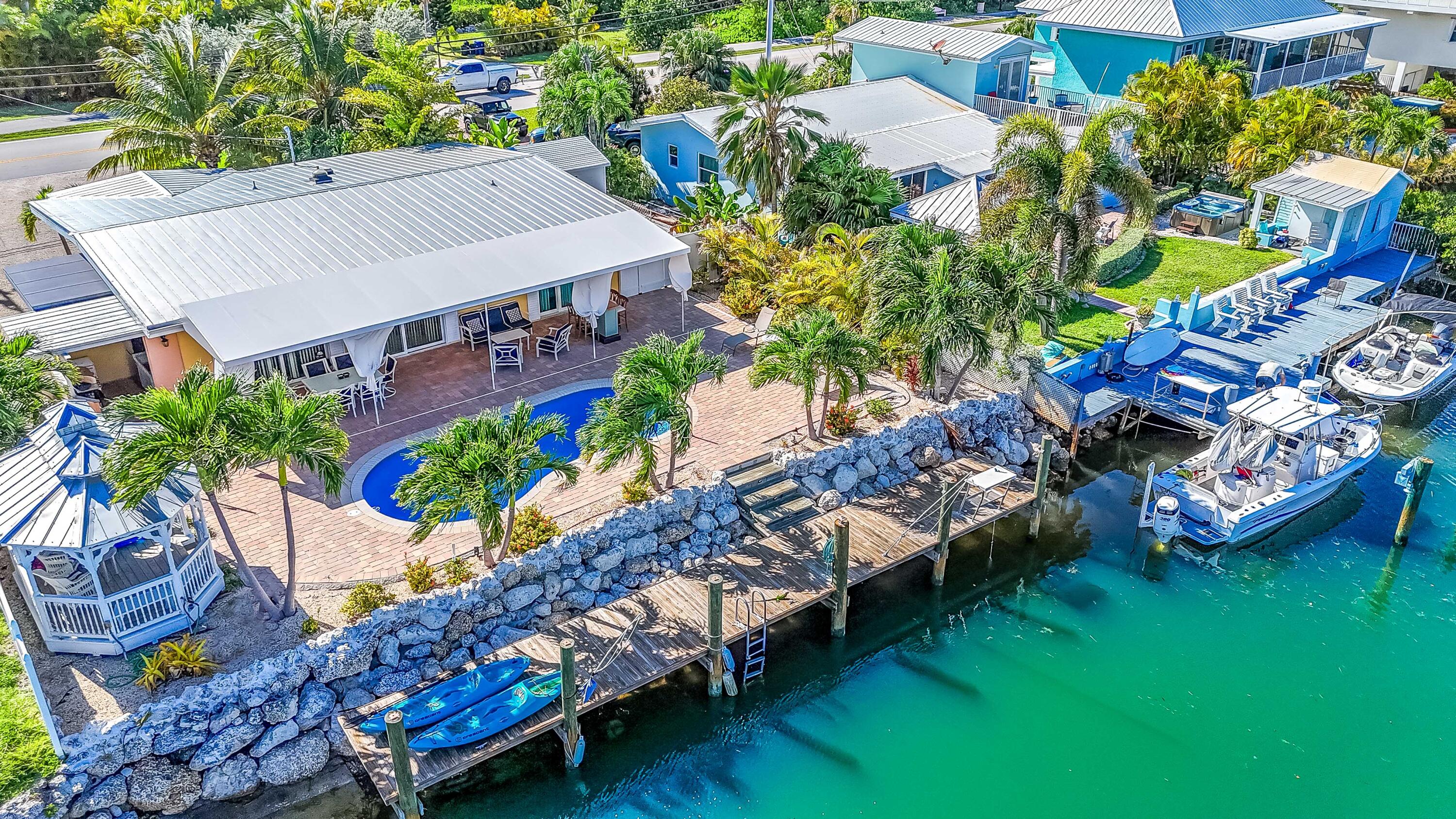 Canal home with a pool and ocean access