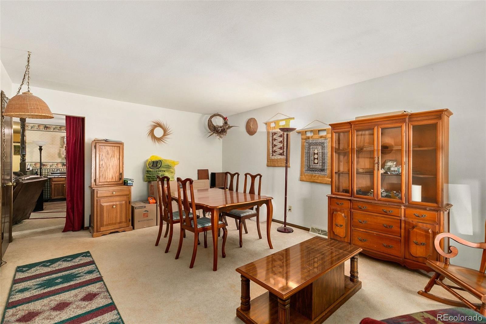 13 Maple Drive Frederick, CO 80530 - Photo 13 of 32 a dining room with furniture and wooden floor