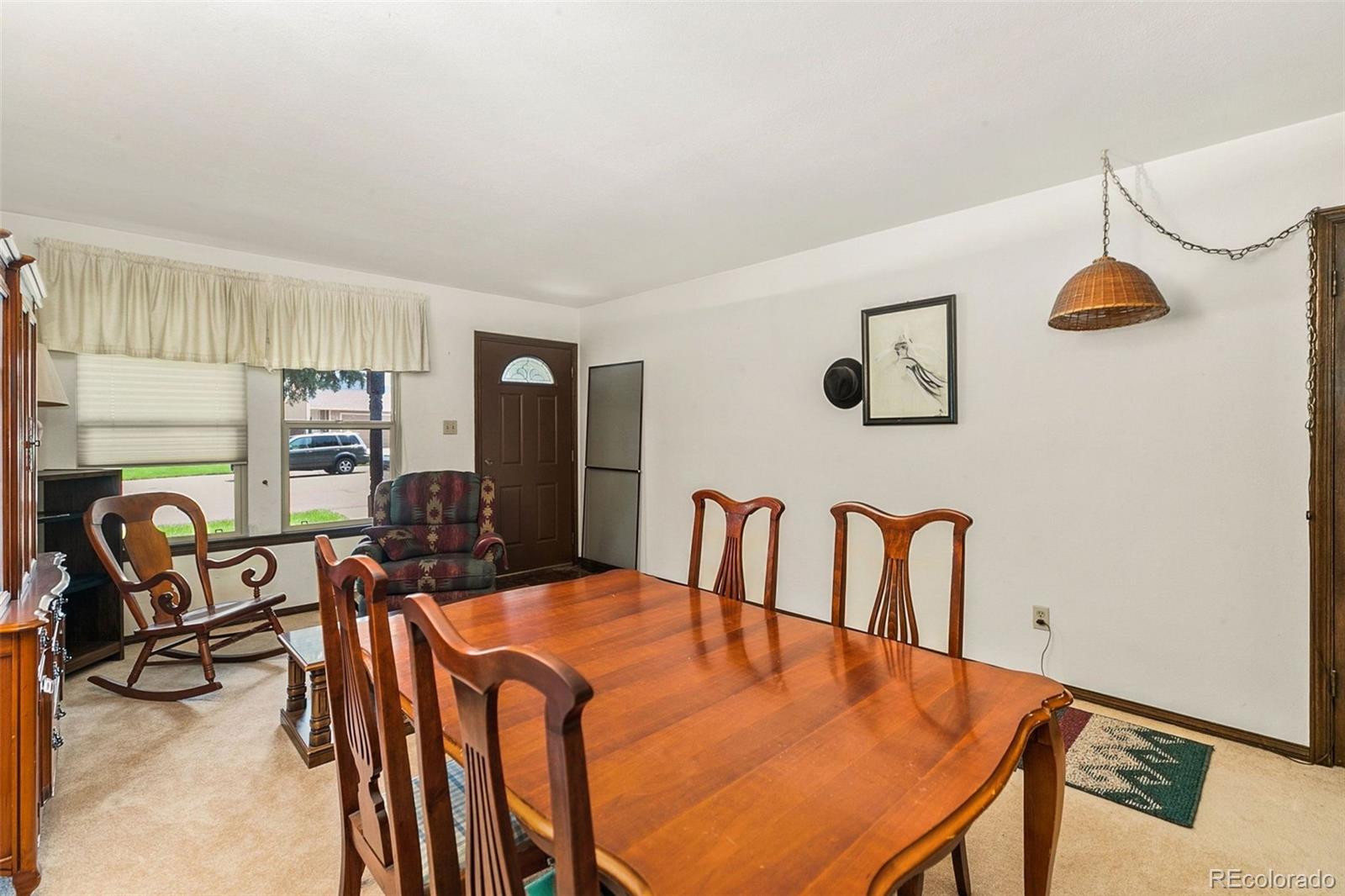 13 Maple Drive Frederick, CO 80530 - Photo 14 of 32 a view of a dining room with furniture