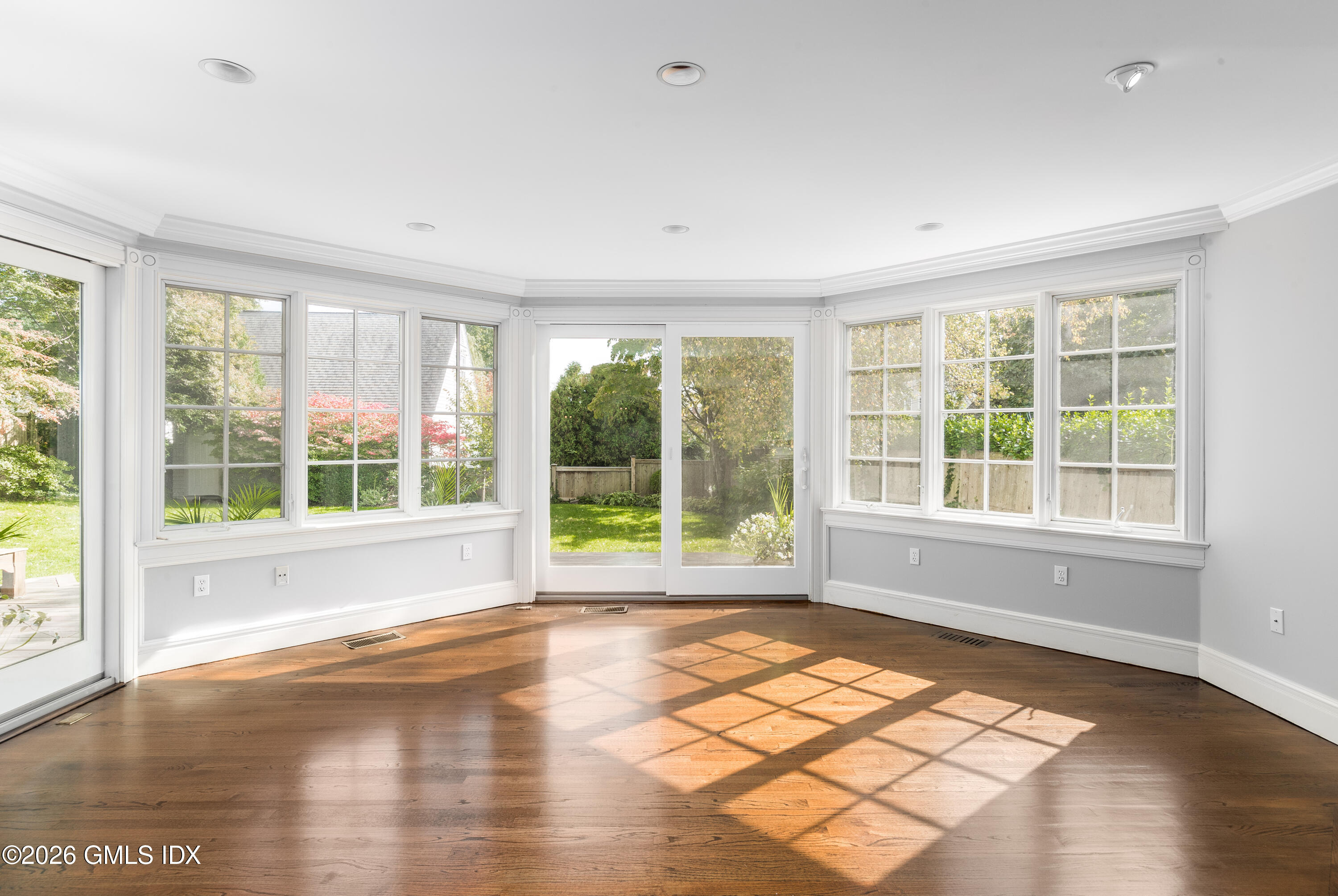 118 Shore Road Old Greenwich, CT 06870 - Photo 14 of 23 Sun-drenced Family Room