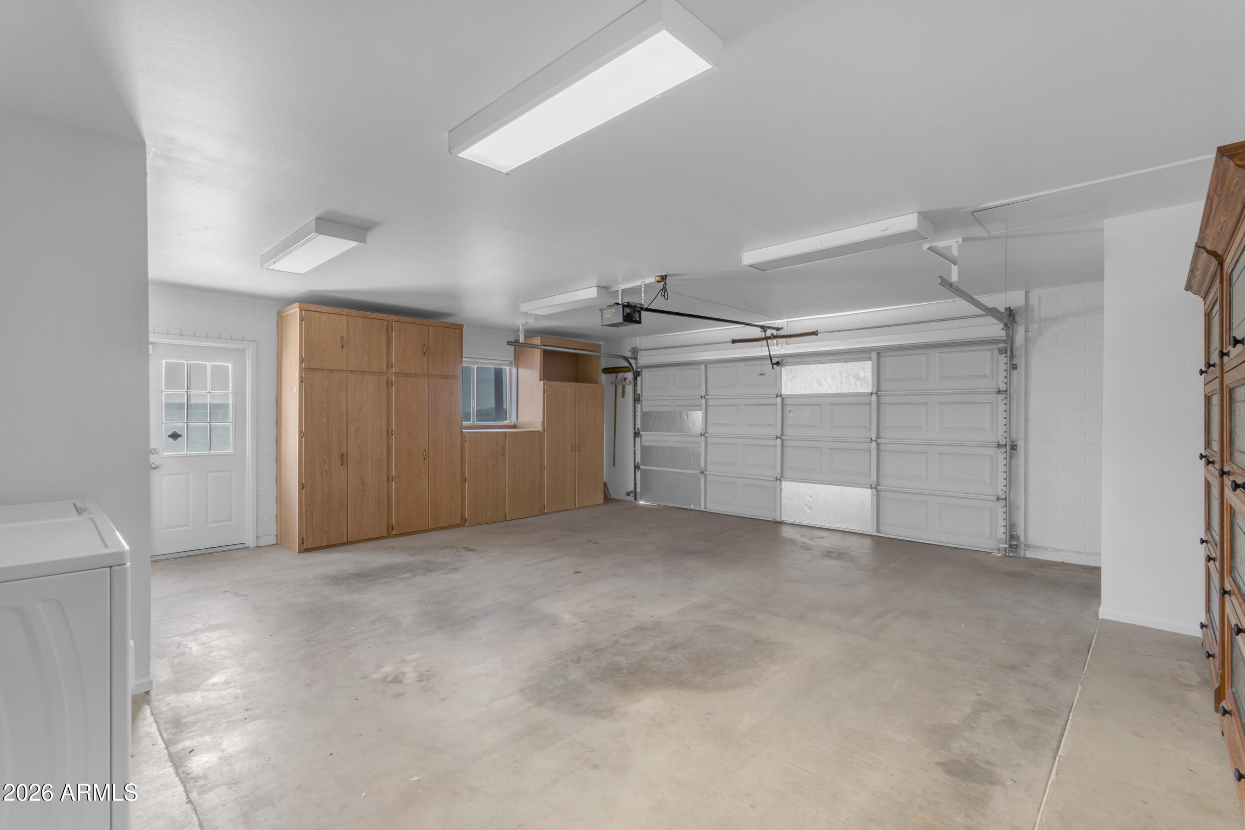 16555 West Lower Buckeye Road Goodyear, AZ 85338 - Photo 32 of 55 Garage with Storage
