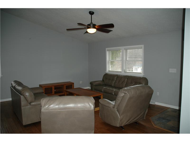 290 Lagonda Road Washington, PA 15301 - Photo 3 of 10 Living Room. Living room has a cathedral ceiling and hardwood floors.