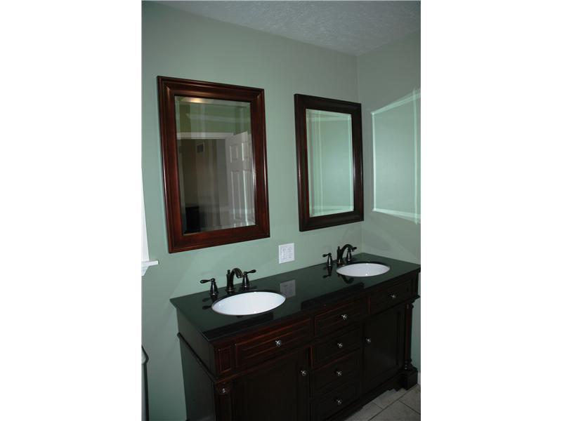 290 Lagonda Road Washington, PA 15301 - Photo 8 of 10 Master Bath/Spa. The master bathroom has double sinks.