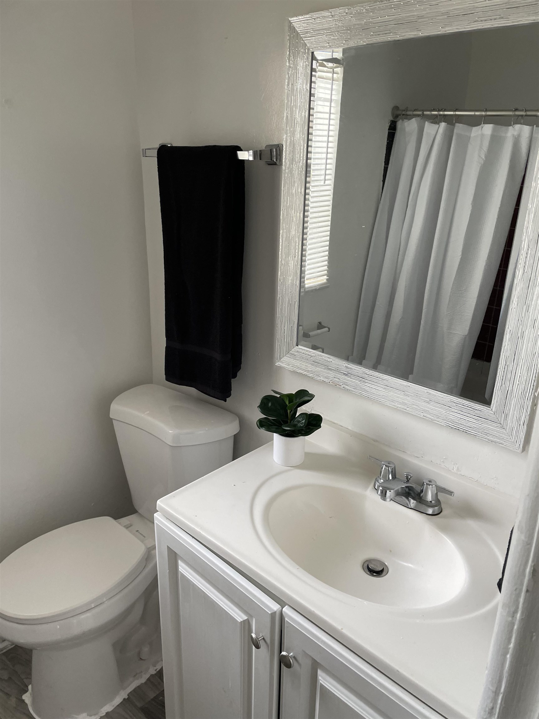 6 Christopher Street St. Augustine, FL 32084 - Photo 13 of 14 a bathroom with a sink and a toilet