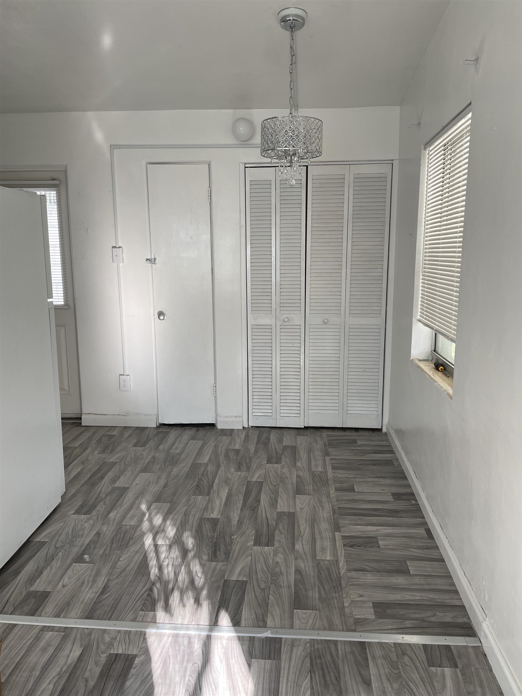 6 Christopher Street St. Augustine, FL 32084 - Photo 6 of 14 a view of empty room with wooden floor and fan