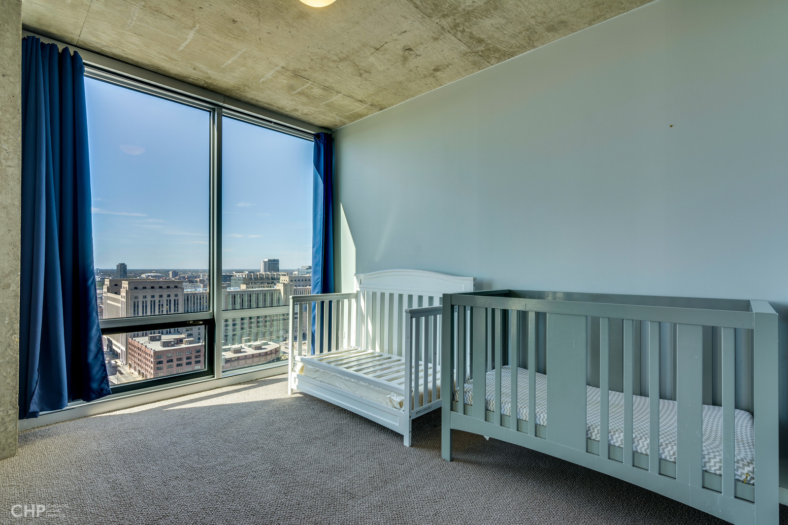 611 South Wells Street, Unit 2907 Chicago, IL 60607 - Photo 12 of 16 a view of livingroom with furniture and floor to ceiling window