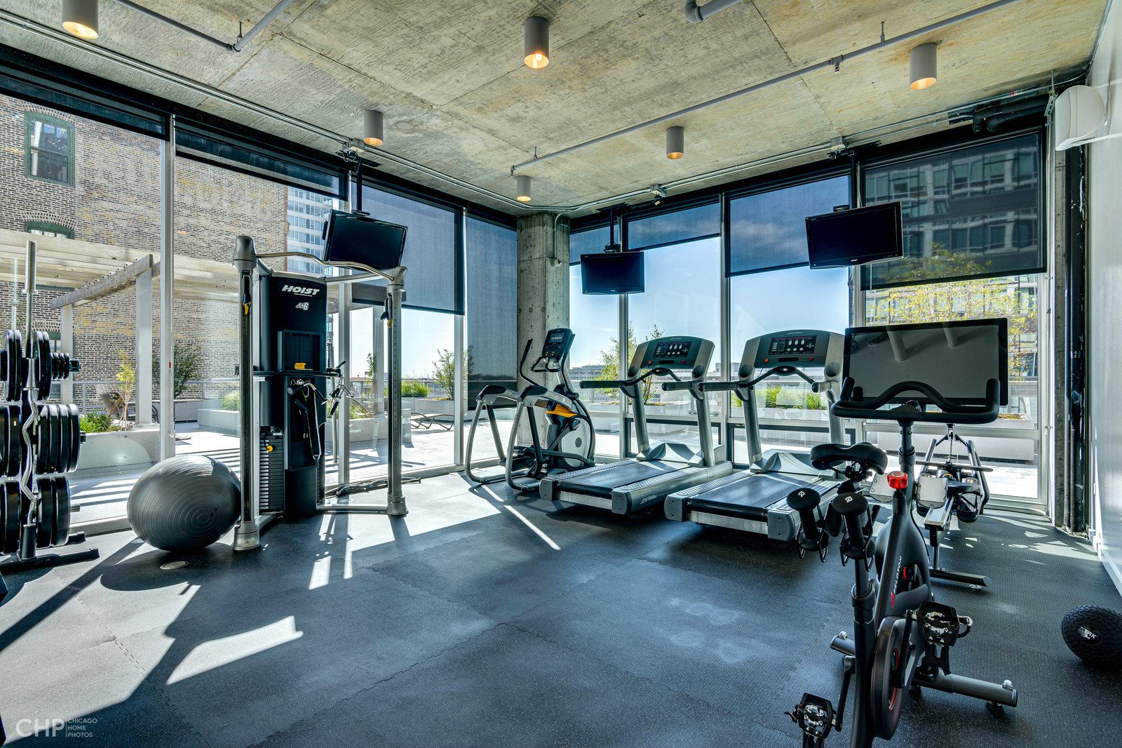 611 South Wells Street, Unit 2907 Chicago, IL 60607 - Photo 16 of 16 a view of a room with gym equipment