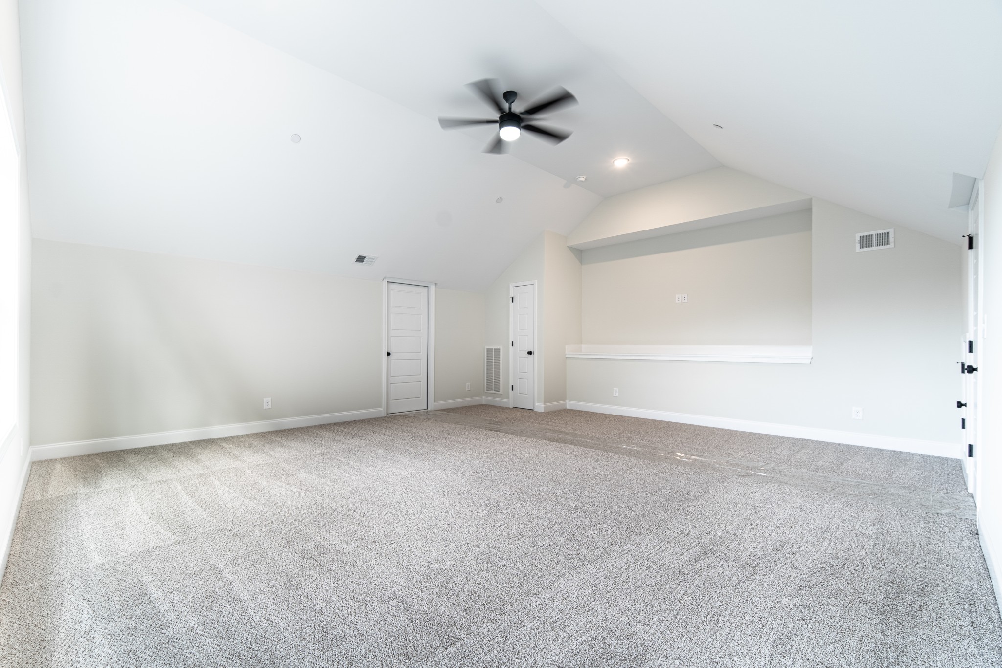 244 Franklin Street Pleasant View, TN 37146 - Photo 29 of 35 an empty room with a ceiling fan and window