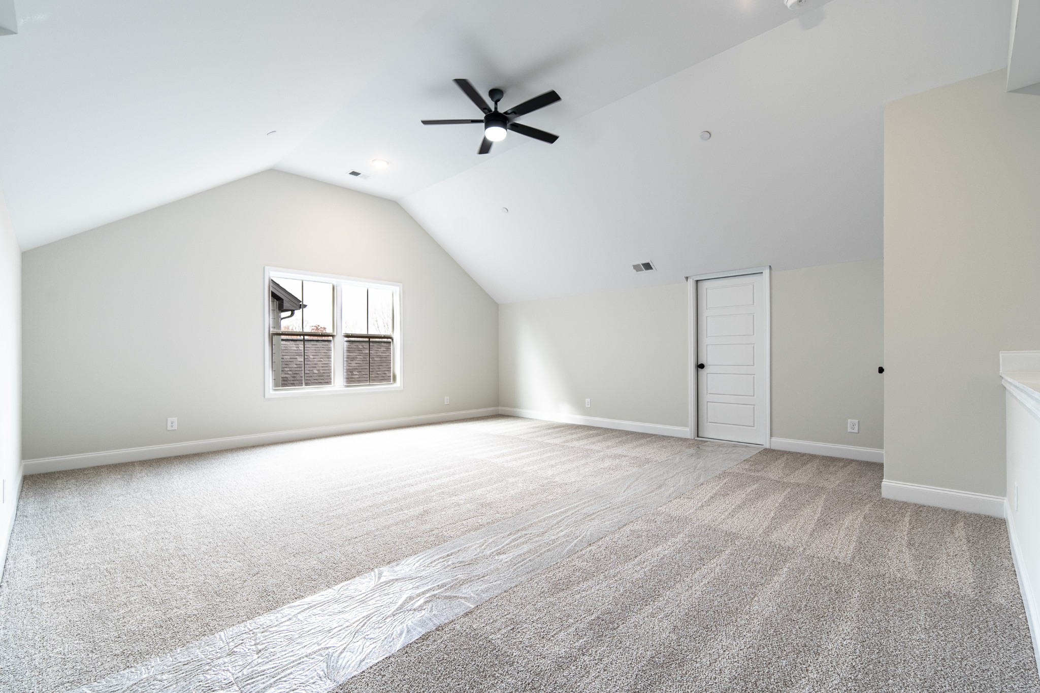 244 Franklin Street Pleasant View, TN 37146 - Photo 30 of 35 an empty room with windows and ceiling fan