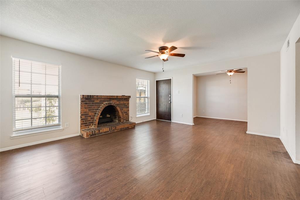 5109 Cedar Springs Road, Unit 115 Dallas, TX 75235 - Photo 2 of 16 Very large living room with electric heater.